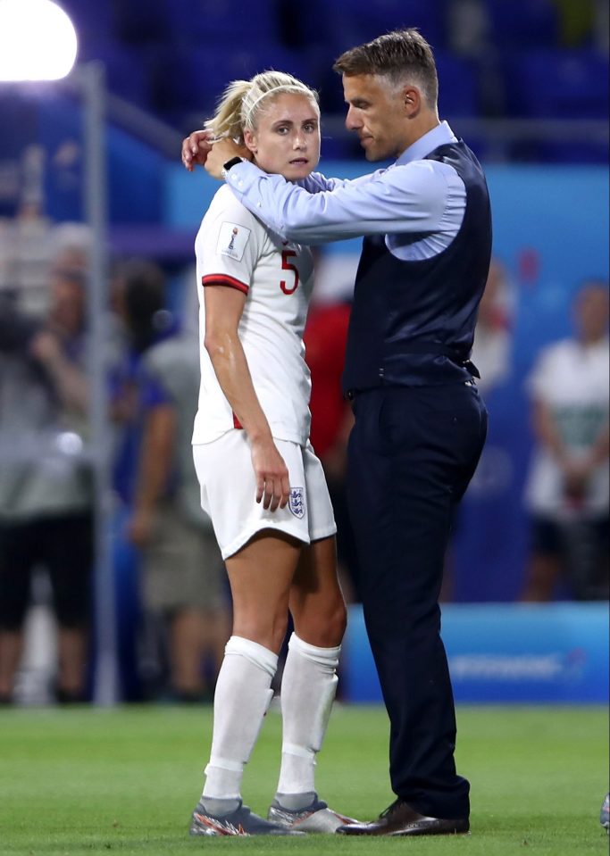  Phil Neville consoles Steph Houghton after the final whistle