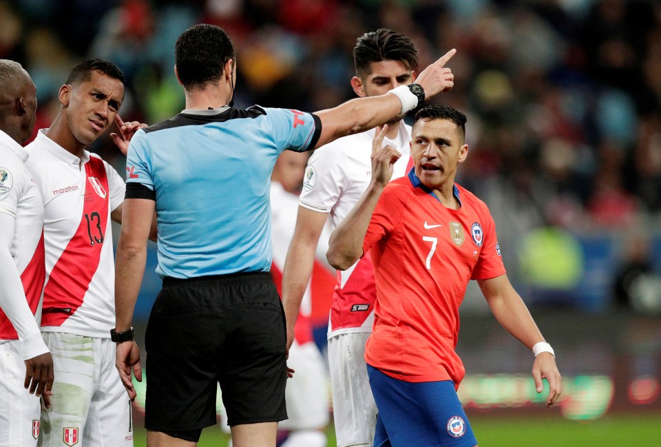  Alexis Sanchez cut a frustrated figure as Chile defender horrendously in their defeat to Peru