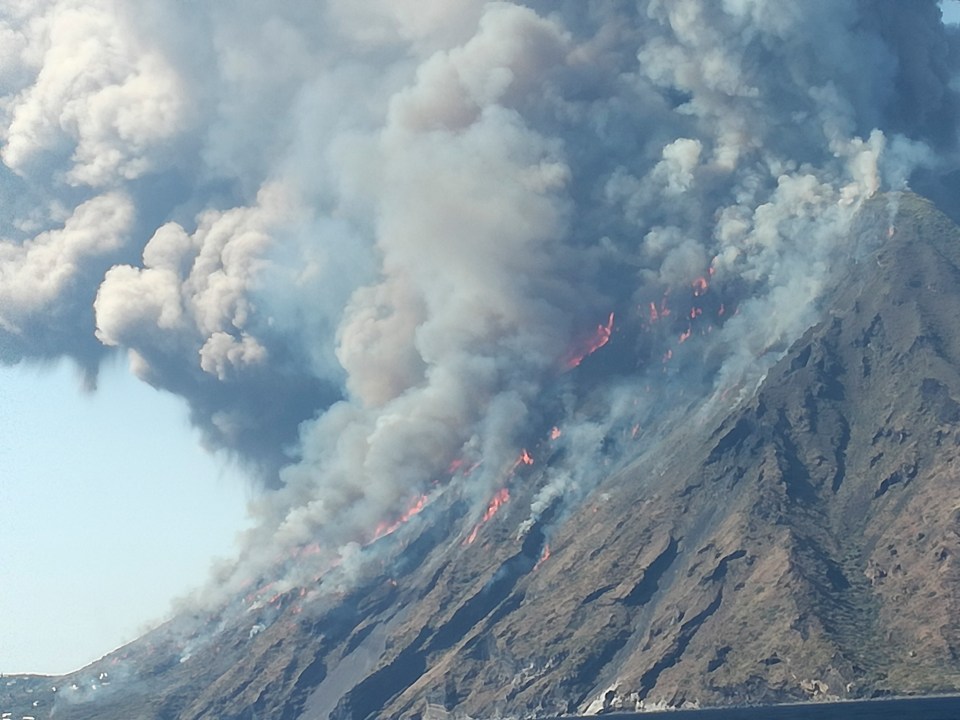  Lava spilled down the slopes and hot rocks and embers rained from the sky