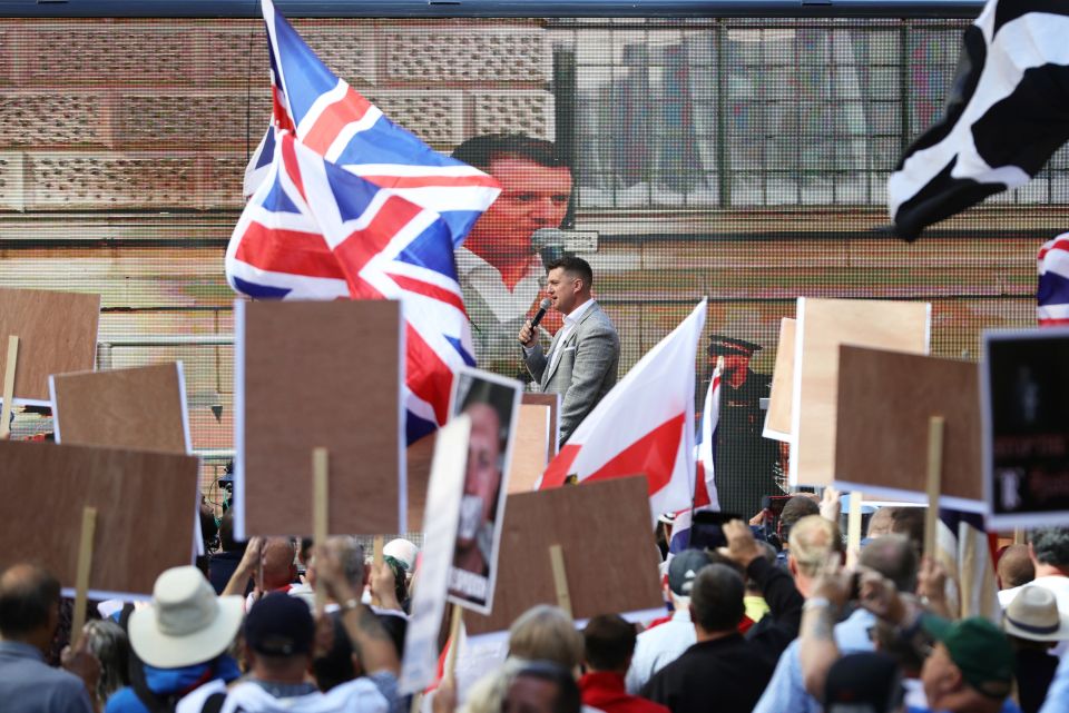  People came with signs and flags to support Robinson as he faces a fresh contempt hearing