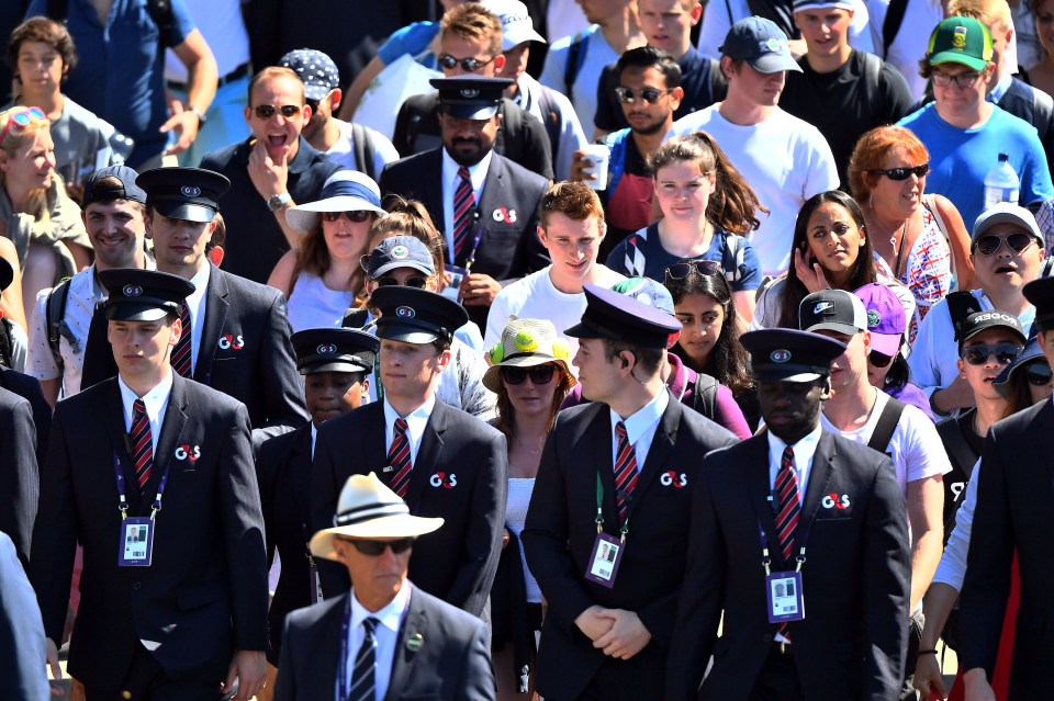 Spectators are led into the grounds at the start of day four of the Wimbledon Championships at the All England Lawn Tennis and Croquet Club, Wimbledon