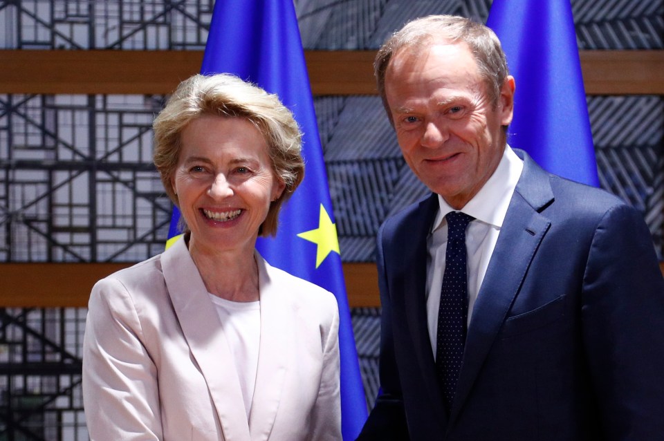  Germany's Ursula von der Leyen is congratulated on her new job by Donald Tusk