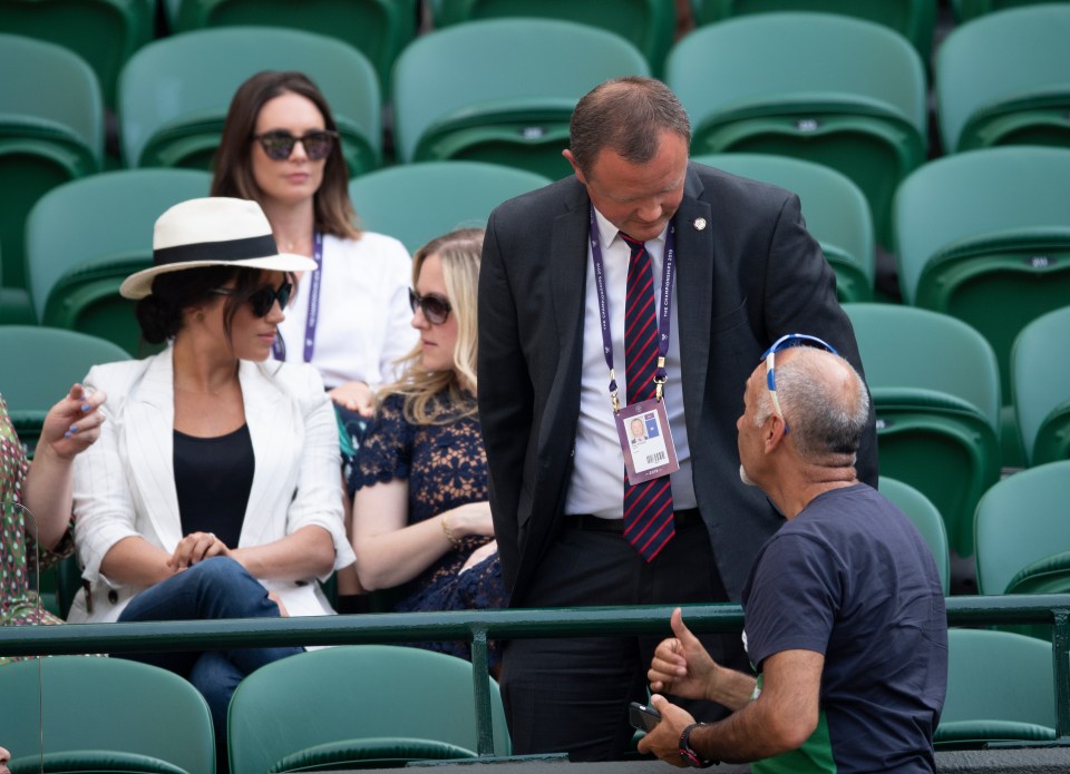  Security were then seen speaking to the fan who was actually taking a selfie