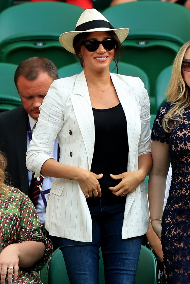  The Duchess looked was rocking a smart white blazer and casual denim jeans