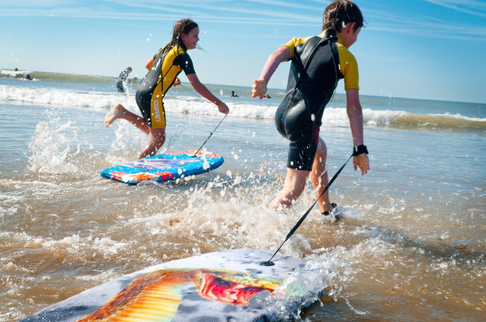  Take a morning surf lesson at the Porthcawl Surf School and enjoy sandy beaches