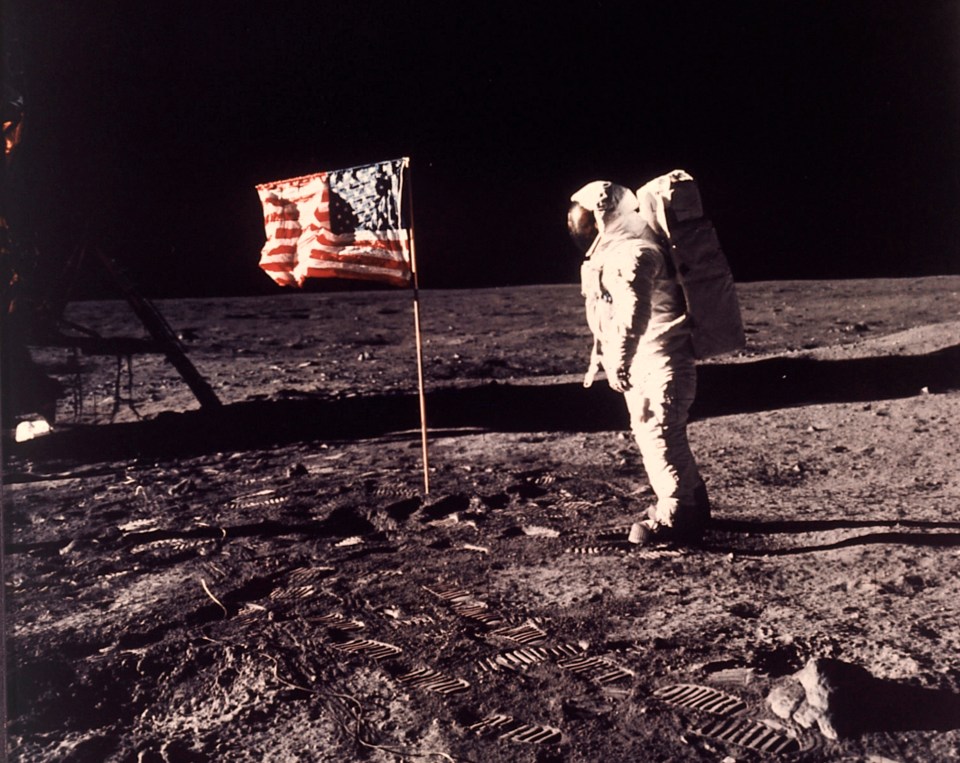  In this image provided by NASA, astronaut Buzz Aldrin poses for a photograph beside the U.S. flag deployed on the moon during the Apollo 11 mission on July 20, 1969