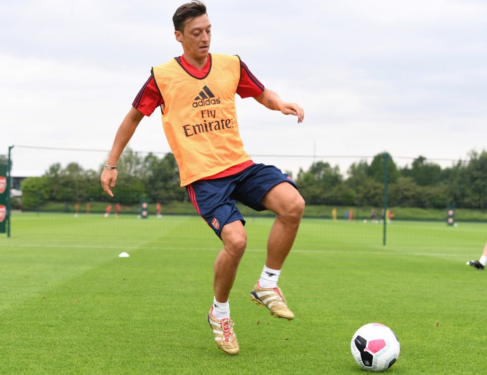  Mesut Ozil was back in pre-season training at Arsenal's London Colney training base