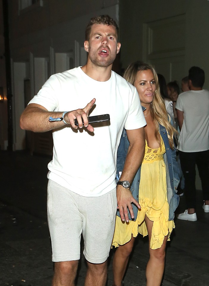  Caroline Flack holds hands with her personal trainer Bradley Simmonds