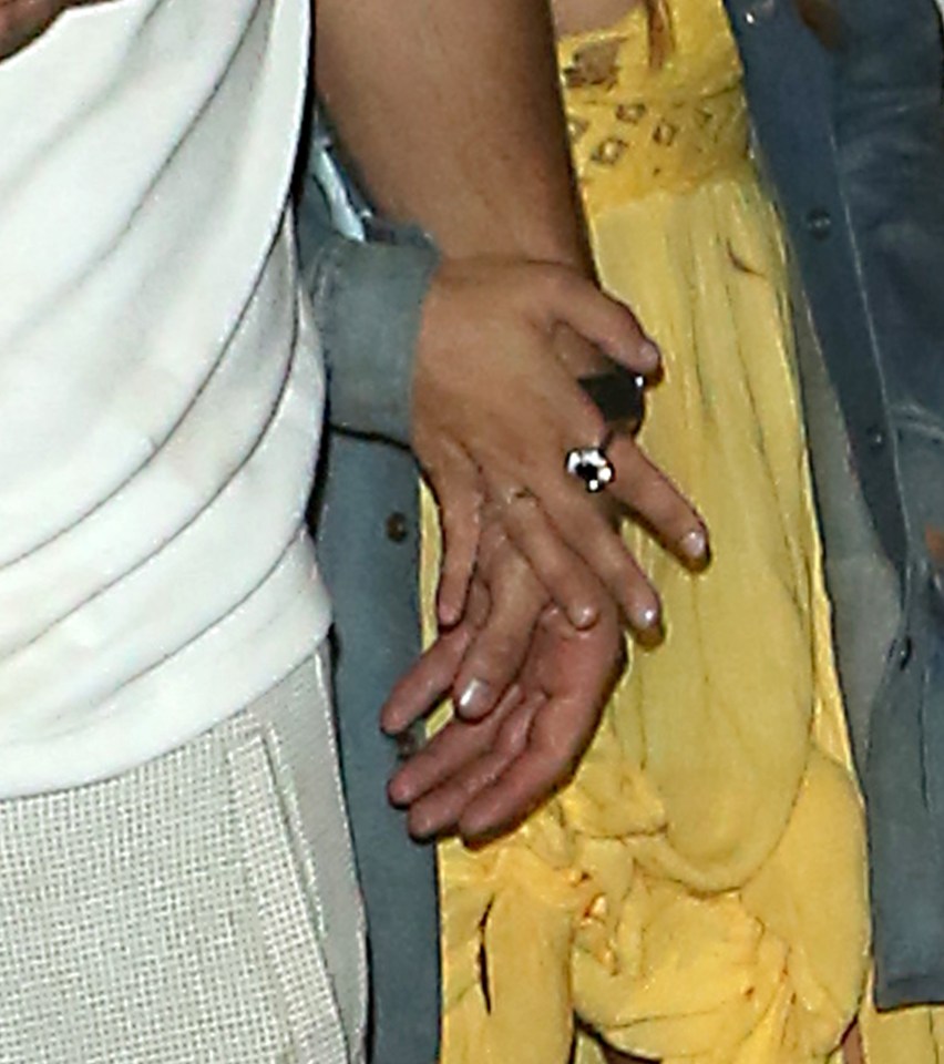  The pair held hands