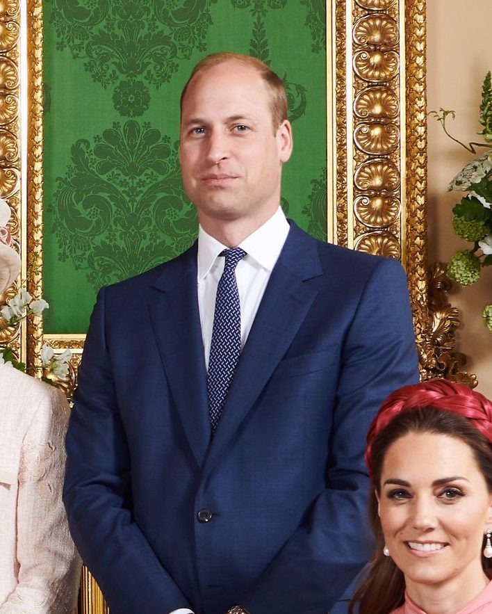  Prince William looked like he was in nightclub bouncer mode, a body language expert said