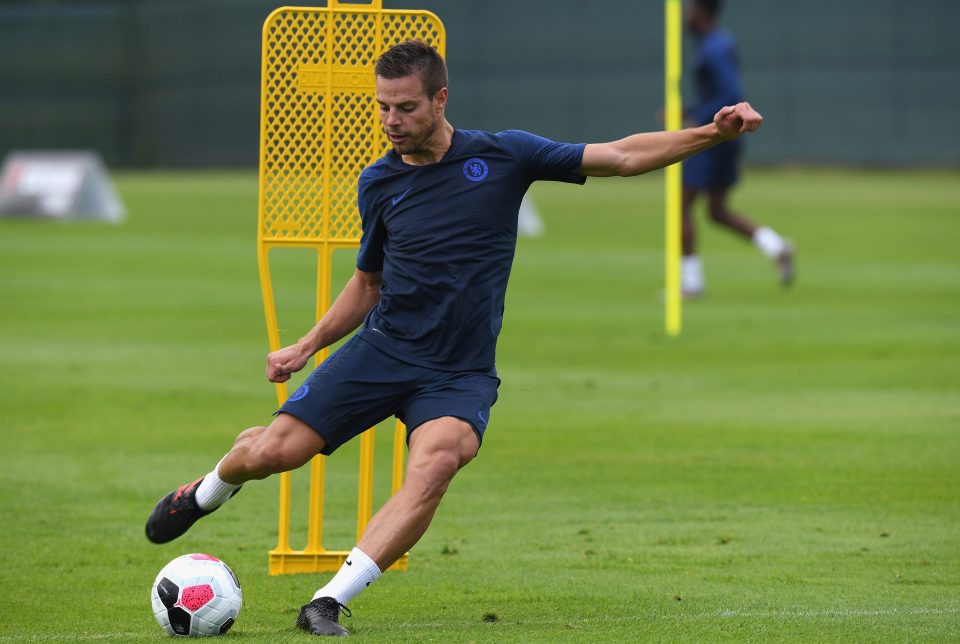  Cesar Azpilicueta fires a long pass during the training session