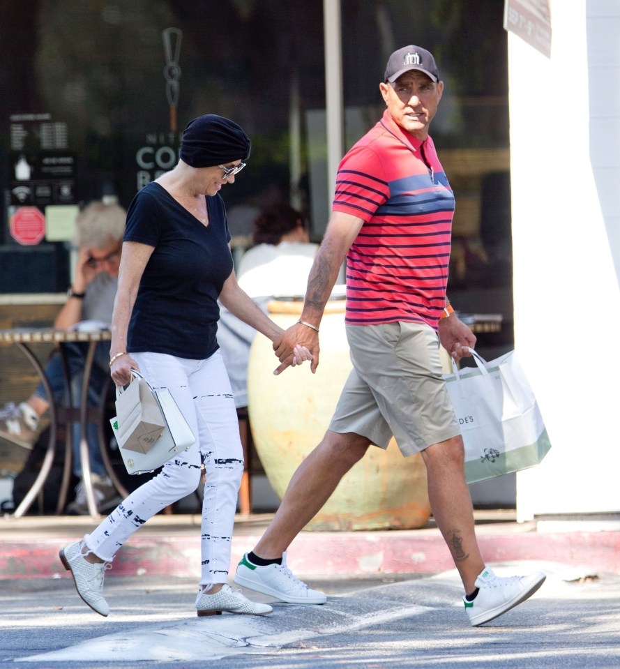  Tanya pictured in August last year holding hands with her husband in LA