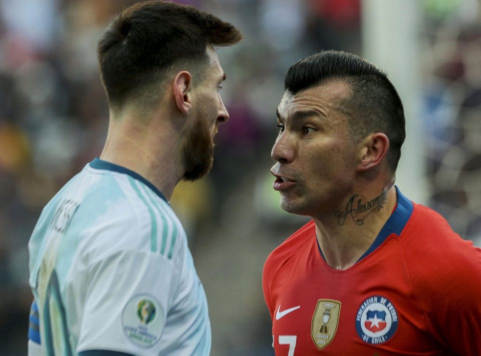  Lionel Messi and Gary Medel clash in the Copa America before the pair are sent off