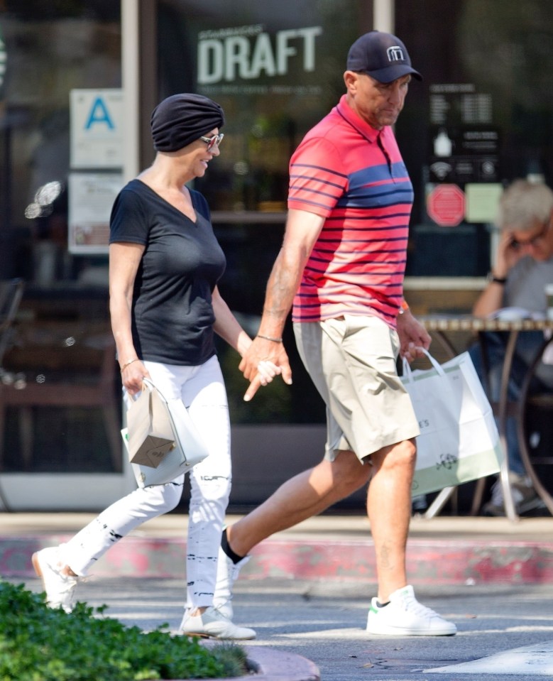  Vinnie Jones walks hand-in-hand with wife Tanya as she battles cancer in Los Angeles, last year