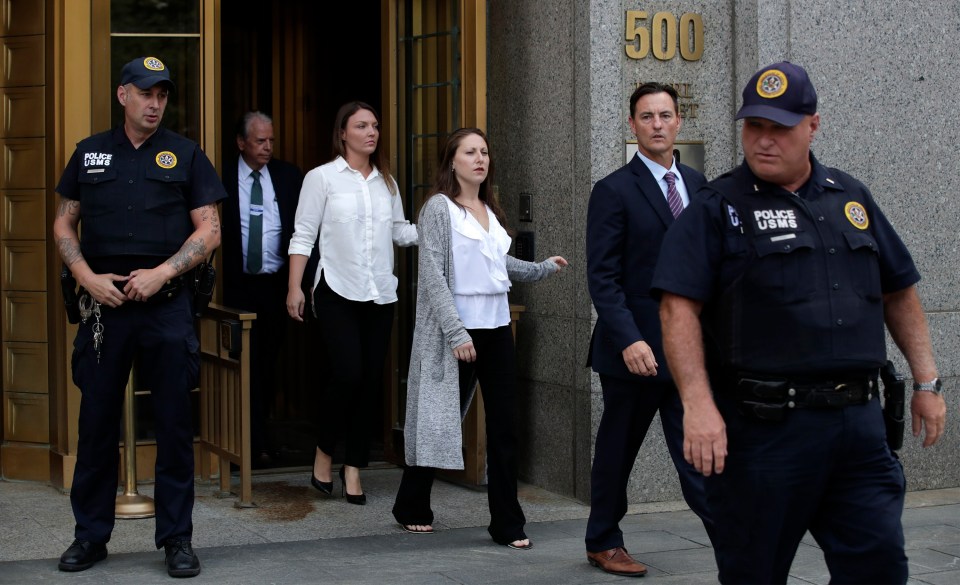 Alleged sexual victims of American financier Jeffrey Epstein, Courtney Wild, left, and Michelle Licata, right, depart United States Federal Court