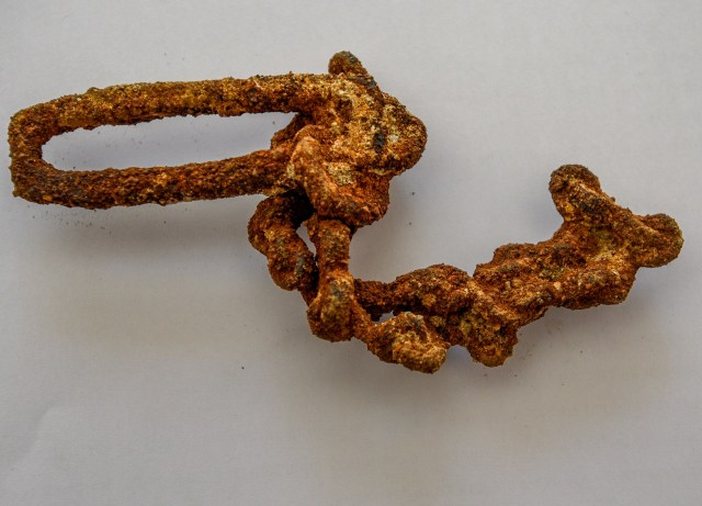  The researchers also found this part of a metal horse bridal, indicating that horses were used during the looting