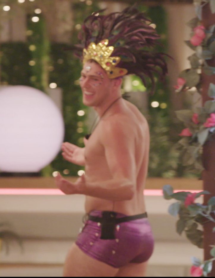  Curtis wore a pair of purple hot pants for his dance