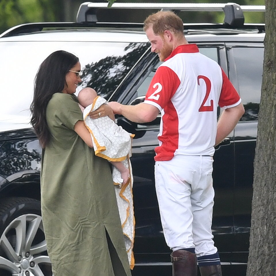  Doting dad Prince Harry says hello to his eight-week-old son Archie