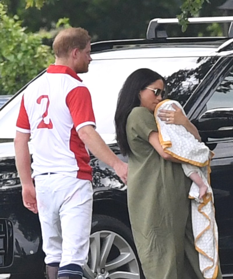  Meghan Markle looked every inch the doting mum as she held little Archie in her arms at the charity polo match on July 10