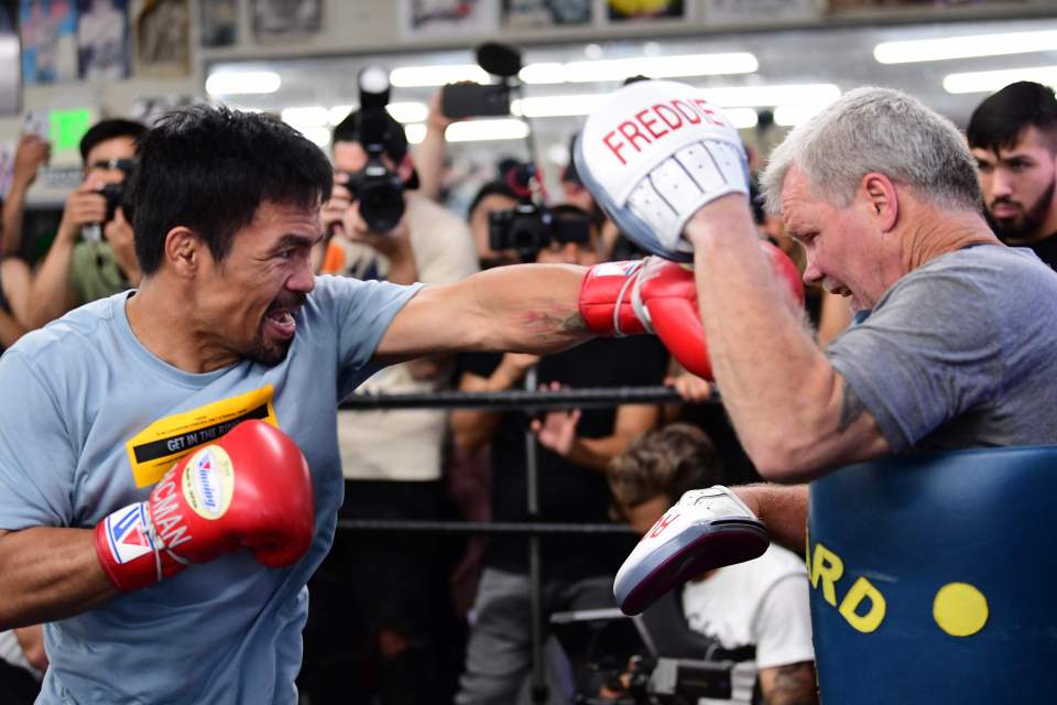  Manny Pacquiao has been sparring with his Parkinson's-stricken trainer Freddie Roach