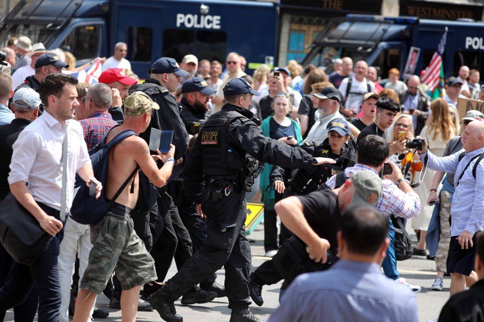  Dramatic photos show how police and protesters clashed on the streets of the capital