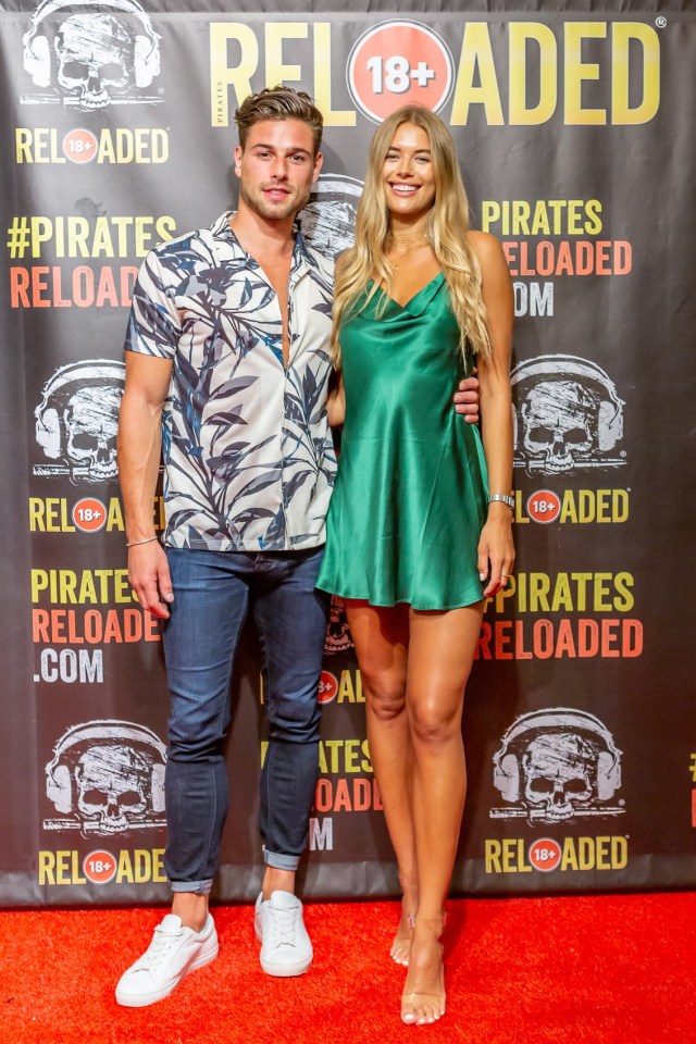  The leggy model and lothario Tom were 'all over each other' at a meet and greet at Pirates Reloaded