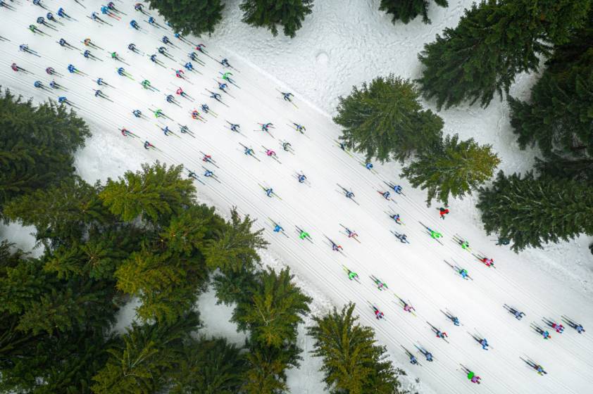  Cross country skiers seen from the air, titled A Shoal of Colorful Fish