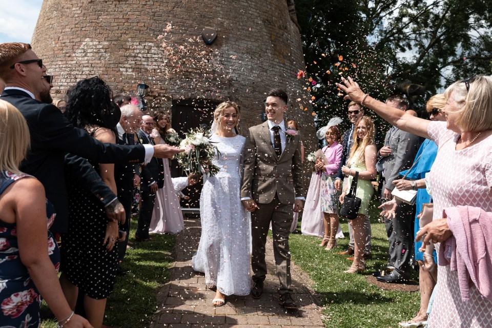  A bride has revealed how she found her stunning wedding dress in a charity shop a day after getting engaged to boyfriend Mike