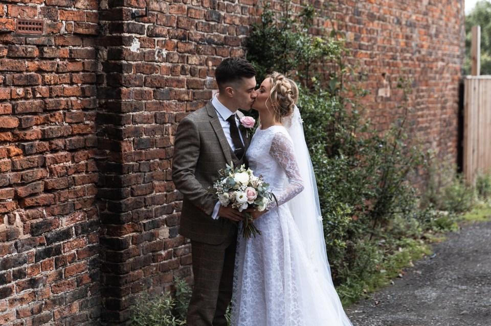  The dress was well-received by guests on her wedding day to Mike - and captured in photos taken by photographer Jack Cook