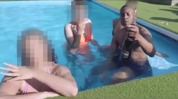 Carty was pictured relaxing in a pool in the video