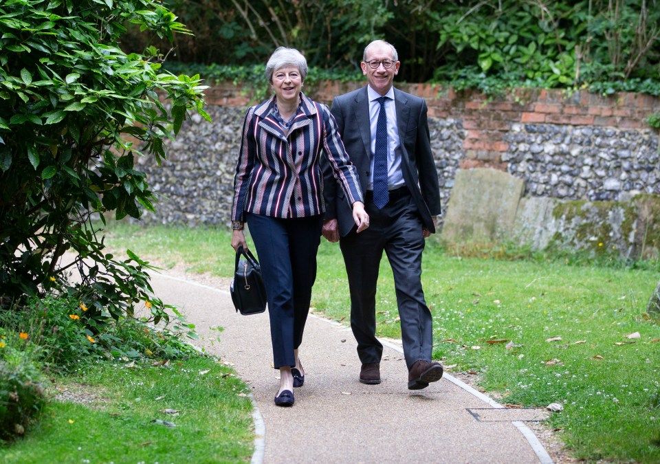  Theresa May at church with her husband this morning