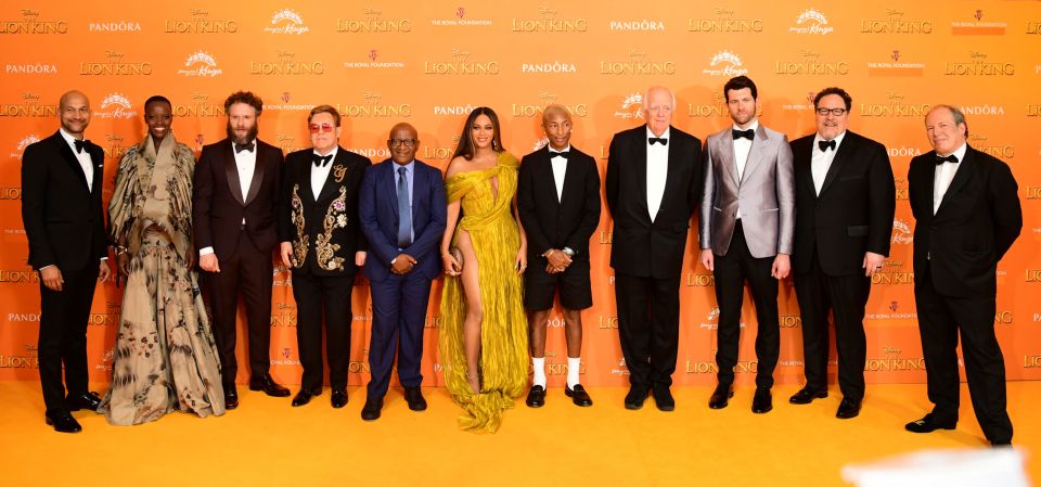  From the left: Keegan-Michael Key, Florence Kasumba, Seth Rogen, Elton John, Lebo M, Beyonce, Pharell Williams, Sir Tim Rice, Billy Eichner, Jon Favreau and Hans Zimmer attending Disney's The Lion King European Premiere held in Leicester Square, London