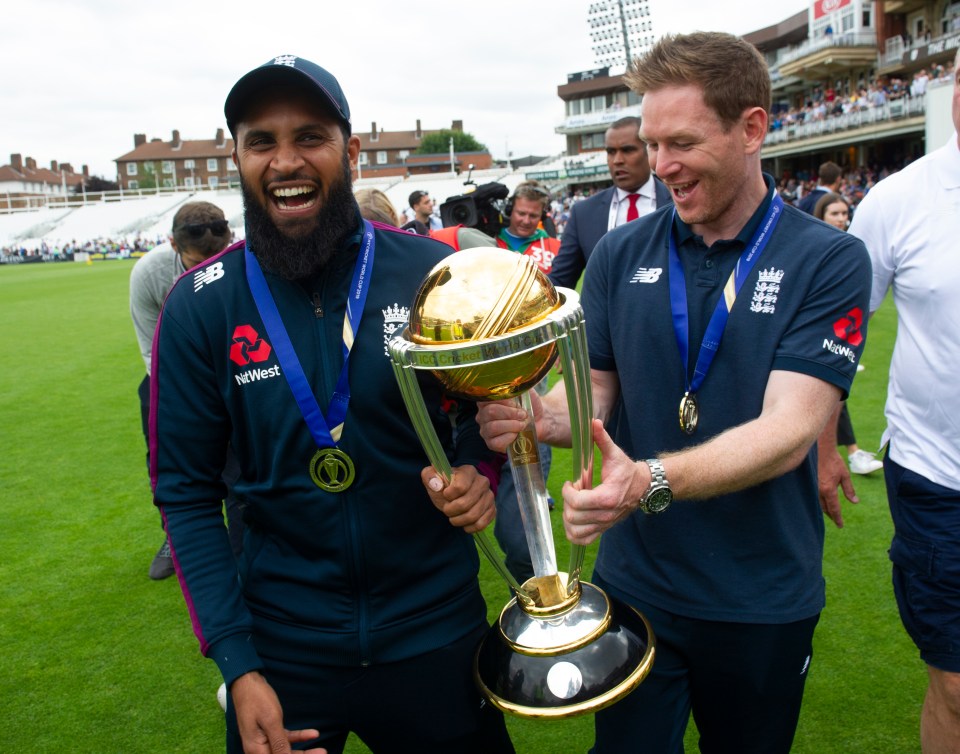  Adil Rashid and Morgan were thrilled to show off the trophy this morning