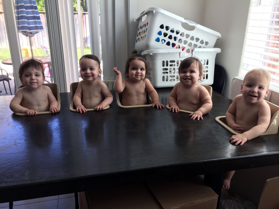  The dad made a custom dining table so all the quints could eat without making a mess