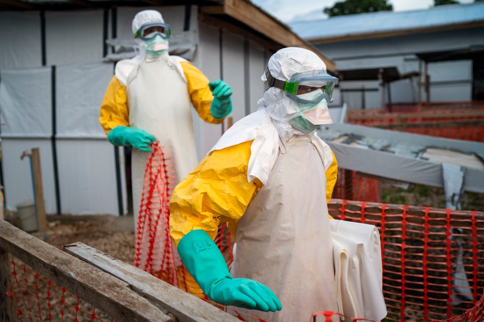  Health workers at an Ebola treatment centre in Beni, Democratic Republic of Congo. The World Health Organisation has declared a global emergency