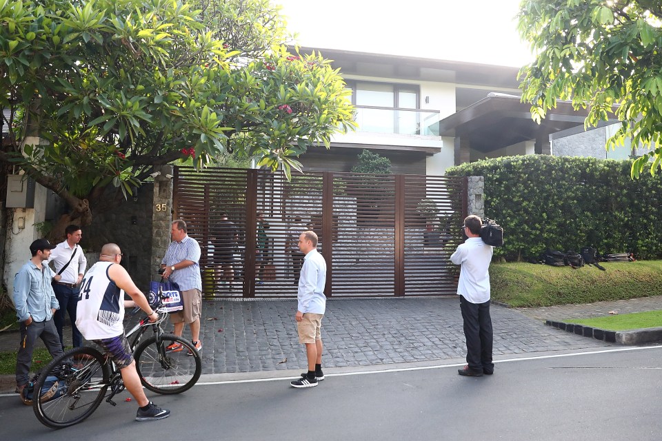  Fans and media gather outside Pacquiao's mansion in Manila