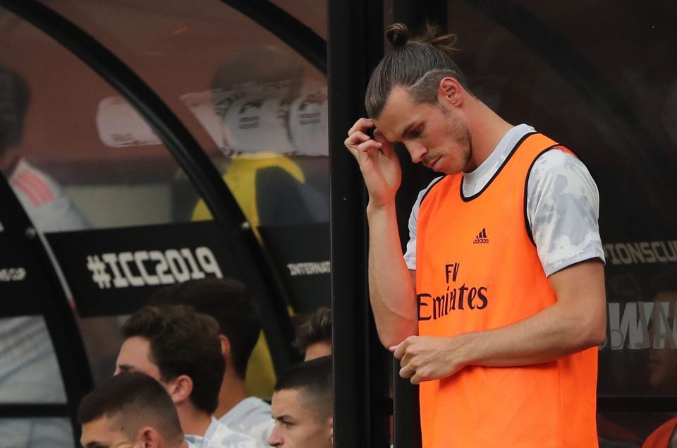  Gareth Bale cut a dejected figure on the sideline as Real Madrid faced Arsenal in the US