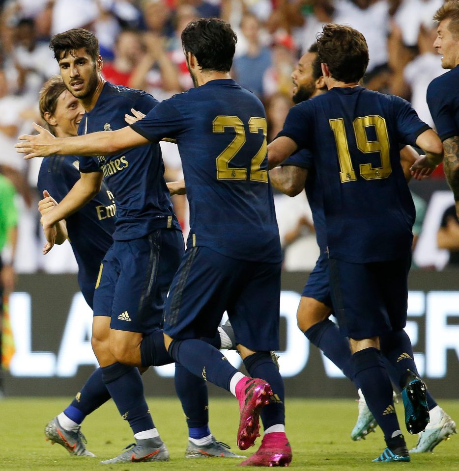  Asensio had only just been celebrating scoring for Real before the injury stuck