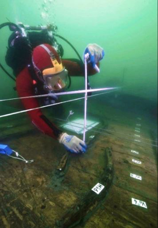  Scientists examining a sunken building at Heracleion