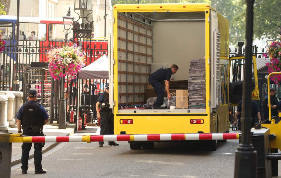  A removals van arrives in Downing street in London this morning