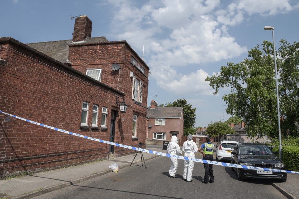  Police forensics officers investigate the scene on Wolverhampton Street