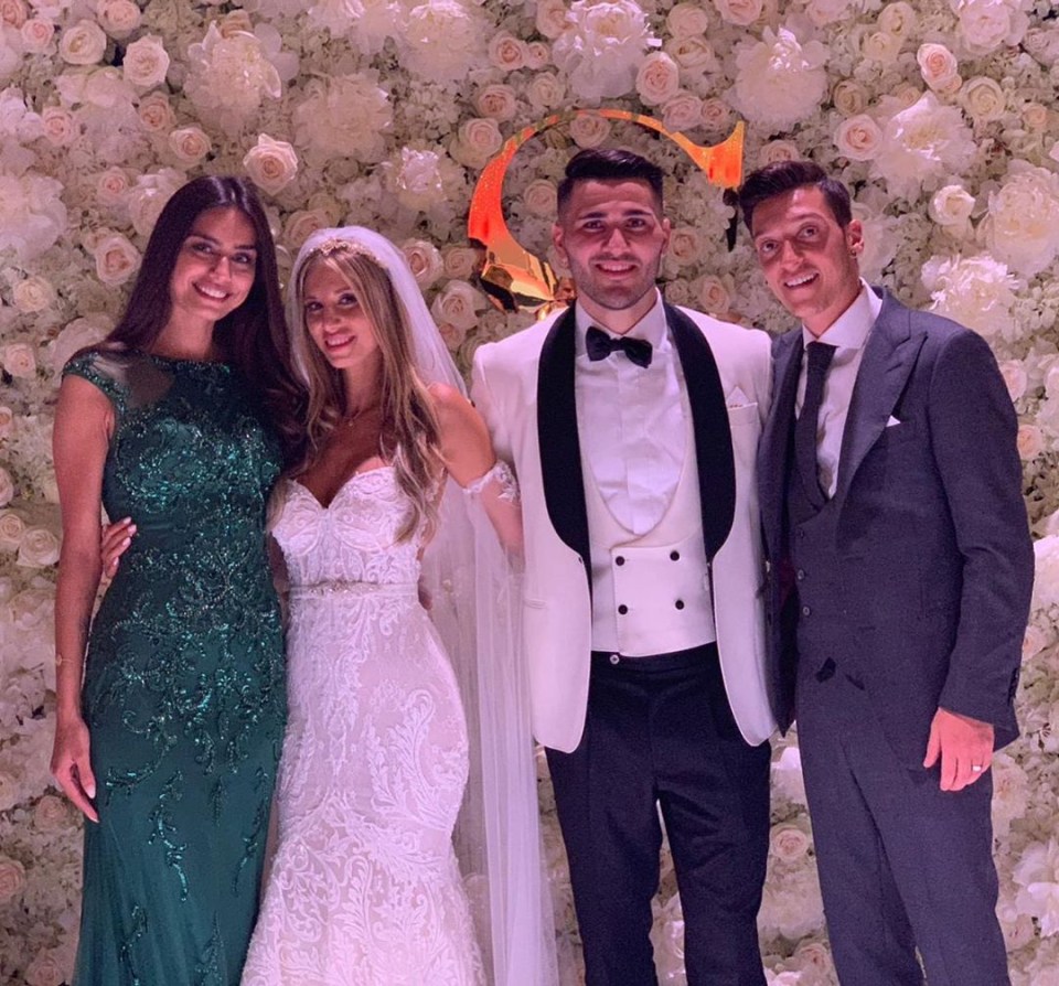  Childhood pals Ozil (right) with wife Amine (far left) at Kolasinac's wedding to Bella last month