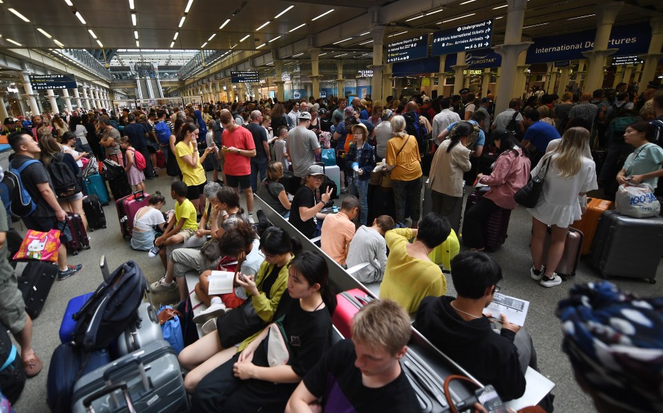  Queues formed at London's St Pancras after Eurostar and national rail trains were cancelled