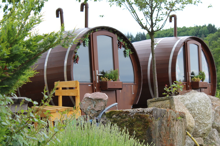  Each barrel has a room with a bed and a separate toilet and shower