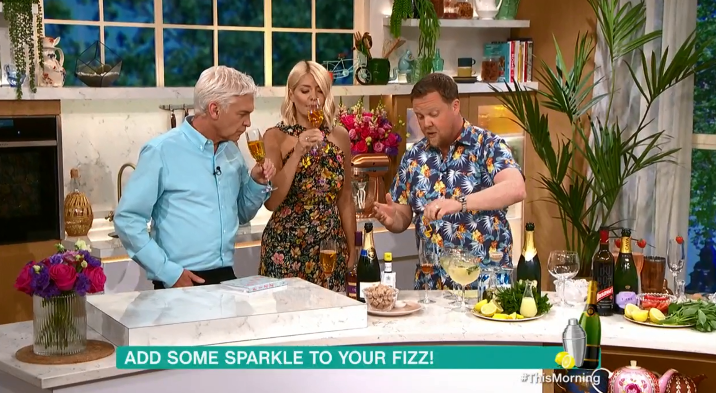  Phil sniffed his champers before giving it a try