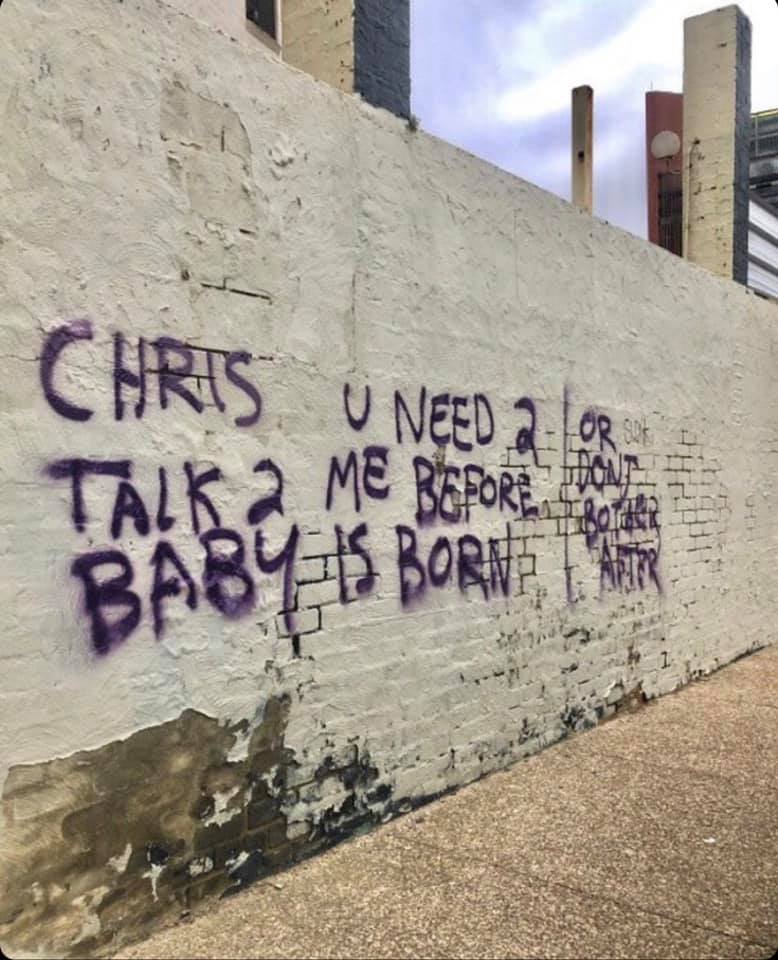  Walls all over town were covered with the words: 'Chris, you need to talk to me before the baby’s born'