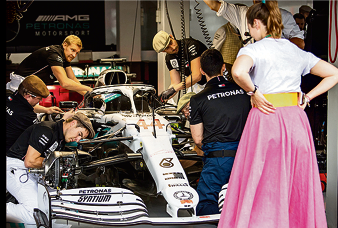  Lewis Hamilton's Mercedes team dressed in retro outfits to hail two big dates