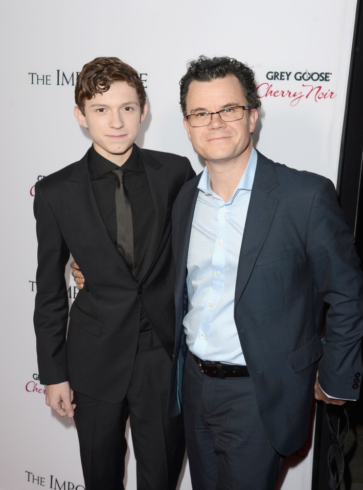  Tom's dad Dominic commented on the news that Spider-Man has been dropped from the Marvel universe (pictured with Tom in 2017)