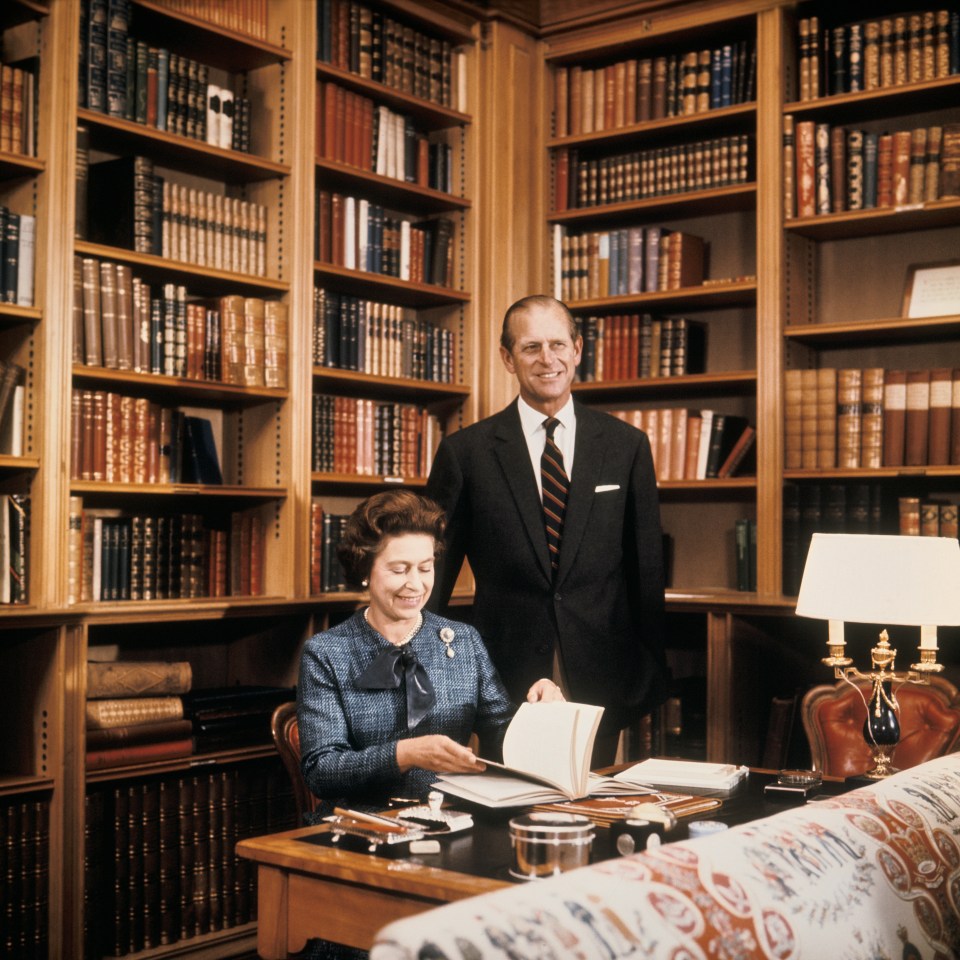 The Queen and Prince Philip in the Balmoral library in 1977