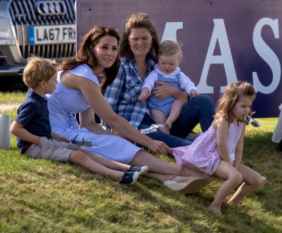  Kate is pictured sitting surrounded by family and friends during a day at the Polo in June 2018